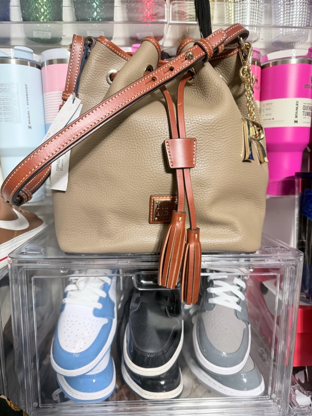 Dooney & Bourke Taupe Pebble Leather Drawstring Bucket Bag with Brown Trim